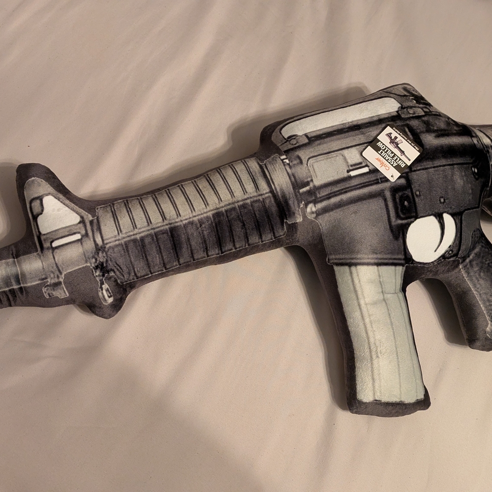 Camco Black and White Gun-Shaped Pillow